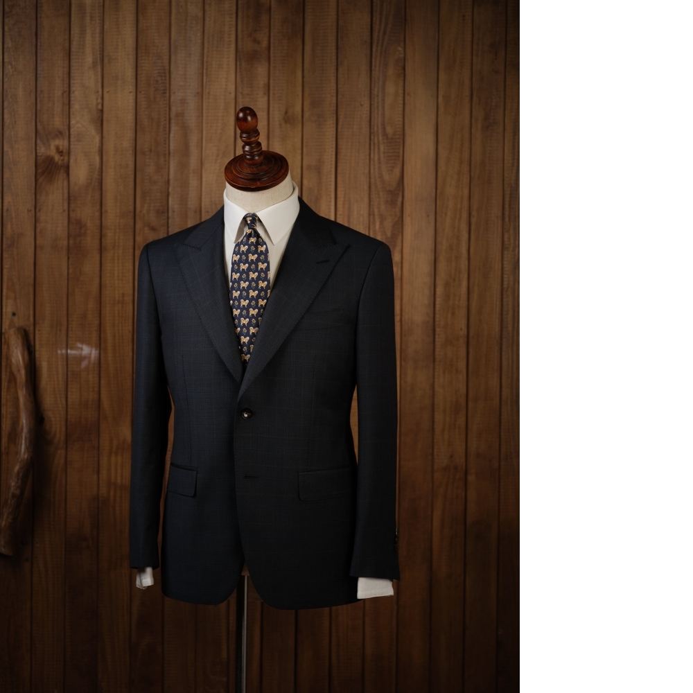 眼見為憑的奢華:Volar 的樣衣堅持,與這件 Zegna 墨綠格紋