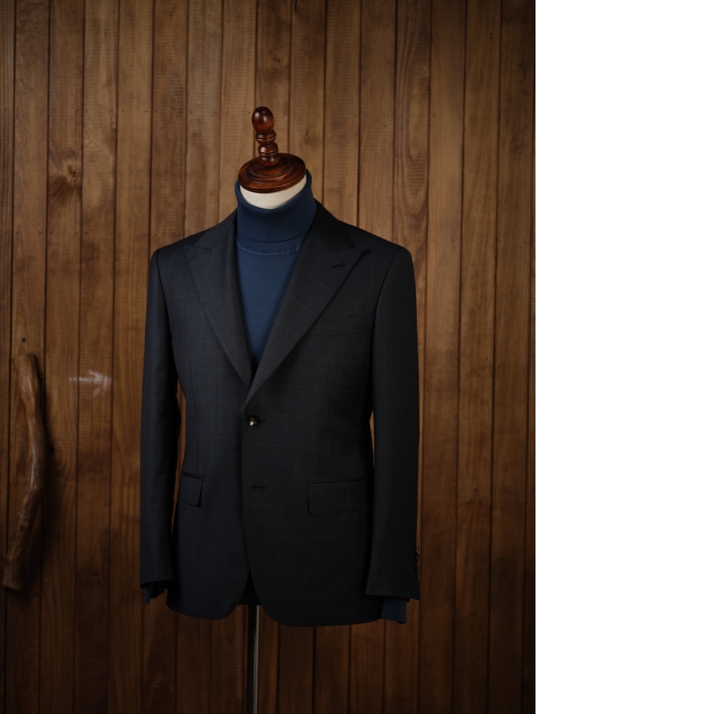 眼見為憑的奢華:Volar 的樣衣堅持,與這件 Zegna 墨綠格紋