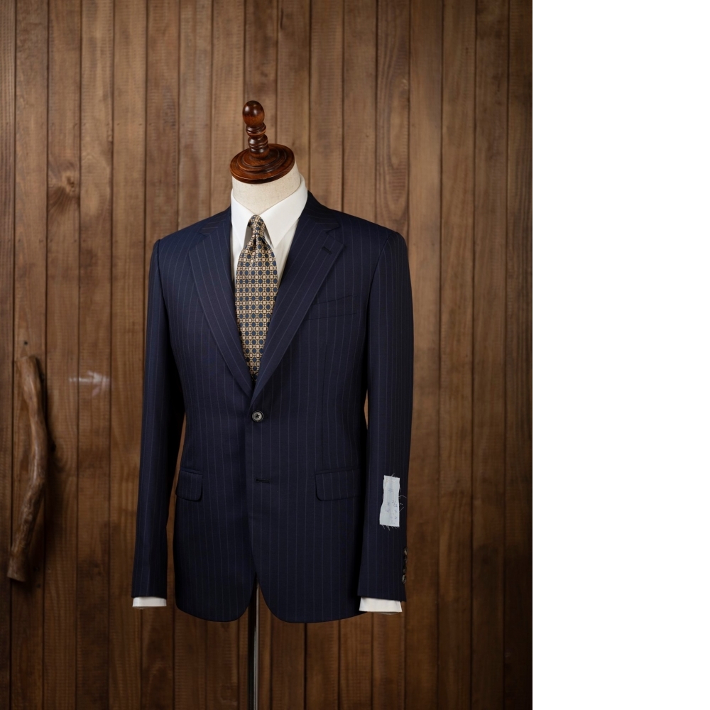 品味的兩種面貌：Zegna 經典條紋 vs. 細膩格紋