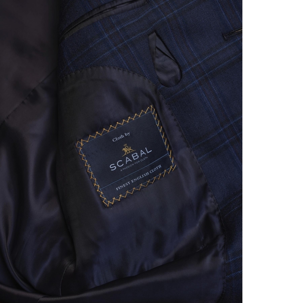 藍色的兩種頂級詮釋：Dormeuil 的純粹 vs. Scabal 的不凡
